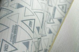 Close-up da palmilha de proteção antiperfuro Premium protec. Feita em tecido, oferece muito mais conforto e maleabilidade ao usuário final.